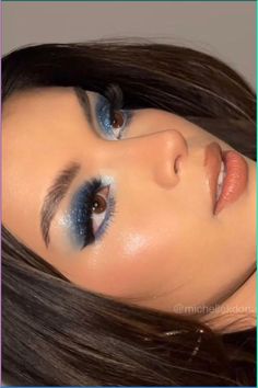 Get inspired by these stunning blue makeup looks that will elevate your glam game! Whether you're aiming for a vibrant blue makeup look for prom or subtle light blue makeup ideas, our curated selection has it all. Dive into the trend with bold blue eyeshadow designs, shimmery finishes, and unique eye makeup techniques that make you stand out. These blue makeup looks. Discover your perfect look and embrace the allure of blue! makeup ideas blue eyeshadow for blue dress Deep Blue Makeup Looks, Blue Liquid Eyeshadow, Blue Makeup Inspiration, Blue Full Face Makeup, Shimmery Blue Eyeshadow, Royal Blue Eye Makeup Prom, Blue Eyeshadow Makeup Tutorial, Makeup For Blue Dresses, Light Blue Makeup Ideas