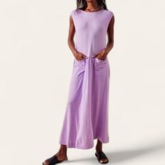 Free People Beach Nikki Cotton Maxi Dress Roundneck Sleeveless Muscle Tee Style 2 Front Pockets Front Pleating In Middle Of Pockets Midi Maxi Length Solid Stretchy Soft Lightweight Cotton Brand New With Tags Will Definetly Fit Xs/S- Mannequin Is Xs/2 Pretty Lilac Lavender Purple Color. Perfect To Throw On/Over Swimsuit. Beachy, Summer, Vacation, Travel, Easy, Casual, Everyday Size Xs Pit To Pit 16" Waist 17" Length 53" Color Purple Excellent New With Tags Condition! Sleeveless Maxi Dress For Beach Daywear, Sleeveless Maxi Dress For Beach Season, Purple Sleeveless Maxi Dress For Beach Season, Sleeveless Purple Maxi Dress For Beach Season, Summer Lavender Fitted Maxi Dress, Sleeveless Purple Beach Dress, Fitted Lavender Maxi Dress For Summer, Purple Loose Fit Dress For Spring, Purple Relaxed Fit Dress For Spring