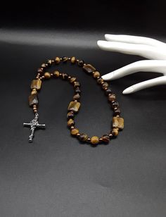 Spiritual Crucifix Jewelry With 8mm Beads, Adjustable Spiritual Cross Necklace, Spiritual Rosary Bracelet With 8mm Beads And Cross, Adjustable Spiritual Crucifix Cross Necklace, Spiritual Brown Cross Necklace, Brown Spiritual Crucifix Jewelry, Spiritual Brown Crucifix Necklace, Brown Crucifix Spiritual Jewelry, Spiritual Brown Crucifix Jewelry