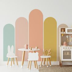 a child's play room with pastel colored walls