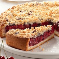 a pie on a plate with one slice cut out