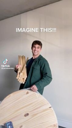 a man standing next to a wooden surfboard