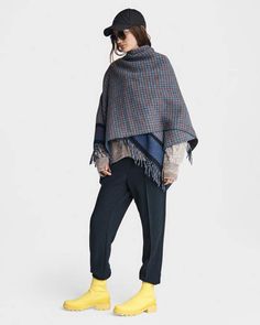 Crafted in Italy from a soft wool blend, Wilshire is a timelessly classic, reversible poncho. Features a houndstooth print on one side and a solid color on the other. rag & bone Women's Midweight Poncho | Charcoal. Oversized Winter Poncho For Work, Winter Workwear Oversized Poncho, Oversized Winter Workwear Poncho, Wool Poncho For Winter Workwear, Winter Wool Poncho For Work, Oversized Wool Poncho For Layering, Wool Poncho For Layering In Fall, Luxury Merino Wool Poncho For Fall, Oversized Brown Wool Poncho