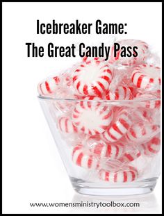 a glass bowl filled with candy canes on top of a white table next to the words icebreaker game the great candy pass