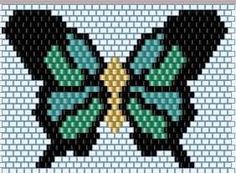 a cross stitch butterfly with green and yellow wings on it's wings, is shown in