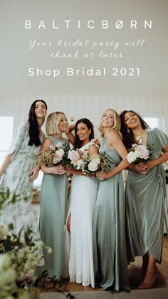 a group of women standing next to each other in front of a sign that says shop bridal