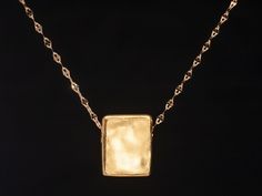 Elegant Square Locket Pendant Necklace, Elegant Square Pendant Locket Necklace, Formal Necklace With Rectangular Pendant And Box Chain, Square Box Chain Necklace For Gift, Gold Hammered Rectangular Jewelry, Hammered Gold Rectangular Jewelry, Square Pendant Necklace With Adjustable Chain, Hammered Square Pendant Jewelry As Gift, Hammered Square Pendant Jewelry For Gift