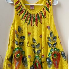 Beautiful Bright Yellow With Multicolored Design Sun Dress . Can Be Use With Leggings. Full Flare Perfect For Summer. Free Size Seller. See My Other Listing Olive Green Shirt Dress, Grey Silk Dress, Floral Sun Dress, Athena Dresses, Olive Green Shirt, Doll Brooch, Halter Prom Dresses, Green Shirt Dress, Jessica Howard Dress