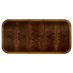 a wooden tray with an intricate design on it