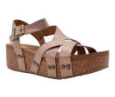 Volatile's Sandcastle sandal features a faux leather metallic upper with metal stud accents and buckle closure atop a 2" cork wedge. Pairs with your favorite jeans or dress. Faux leather metallic upper with metal stud accent and buckle closure Signature ultra comfort EVA insole Synthetic lining Cork 2" wedge with rubber traction outsole Casual Sandals With Gold Studs For Summer, Casual Gold-studded Sandals For Summer, Leather Sandals With Gold Studs For Spring, Spring Sandals With Gold Studs And Round Toe, Tractor Supplies, Tractor Supply, Sand Castle, Cork Wedge, Boot Shoes Women