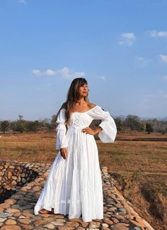 Handmade white wedding dress with smocked and lace up on the bust. Elastic waist . Elastic shoulder and sleeve. Smocked in the front and at the back. Color White and off white. Can be worn as a off shoulder and cover shoulder. Measurements: Bust 30 inches stretch up to 42 inches around. Waist 26 inches stretch up to 41 inches with elastic. Length 55 inches. (can be longer if you wear as a off shoulder dress) Sleeve long 23 inches. CARE: Machine wash cold. White Bohemian Off-shoulder Maxi Dress, White Bohemian Dress With Smocked Bodice, White Maxi Dress For Destination Wedding In Summer, Flowy Off-shoulder Maxi Dress For Wedding, Fitted Bohemian Maxi Dress With Smocked Bodice, Billowy Bohemian Peasant Dress, Summer Maxi Dress For Destination Wedding, Bohemian Peasant Dress With Smocked Bodice, Bohemian Off-shoulder Wedding Dress