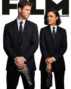 a man and woman in suits standing next to each other on the cover of film magazine