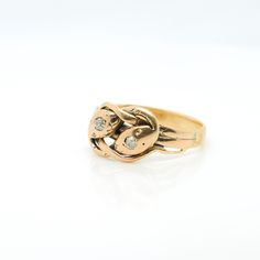 A fine antique gold & diamond figural snake ring. In 14K gold. In the shape of 2 intertwined snakes. Each pave set with a round single cut diamond to their heads and traces of an etched design. Simply a wonderful late Victorian ring! Date: Early 20th Century Overall Condition: It is in overall fair, as-pictured, used estate condition. Condition Details: One diamond is either slightly out of round or has a small flake to its girdle. The etched design is over-polished and the surface in general is Elegant Yellow Gold Snake Diamond Ring, Formal Yellow Gold Snake Ring With Single Cut Diamonds, Heirloom Yellow Gold Snake Ring For Anniversary, Yellow Gold Snake Ring With Diamond Accents For Anniversary, Heirloom 14k Gold Snake Ring For Formal Occasions, Formal Yellow Gold Snake Ring With Diamond Accents, Antique 14k Gold Snake Ring For Anniversary, Antique Gold Snake Ring For Formal Occasions, Heirloom Yellow Gold Snake Ring