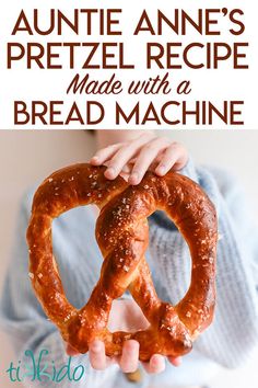 a person holding two pretzels in their hands with the text overlay reads, anette anne's pretzel recipe made with a bread machine