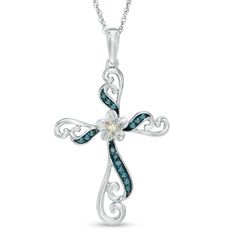 A radiant look she'll adore, this diamond cross pendant is a beautiful representation of her faith. Crafted in sterling silver, this scrolling cross is wrapped in ribbons of alluring enhanced blue diamonds. At its center, a precious and pretty flower sparkles with 10K gold and white diamond accents. Shimmering with 1/10 ct. t.w. of diamonds and a bright polished shine, this pendant suspends along an 18.0-inch rope chain that secures with a spring-ring clasp. Fine Jewelry Crucifix With Diamond Accents, Fine Jewelry Cross With Diamond Accents, Fine Jewelry Cross Shaped With Diamond Accents, White Diamond Accented Crucifix Jewelry, White Crucifix With Diamond Accents, White Crucifix With Diamond Accents Jewelry, White Crucifix Fine Jewelry, Vintage Jewelry Ideas, Blue Diamonds