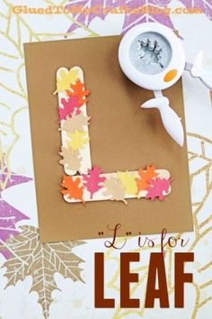 the letter l is for leaf craft with scissors and glue on it next to a paper plate