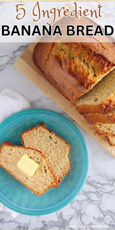 banana bread on a blue plate next to a loaf of bread and a white towel