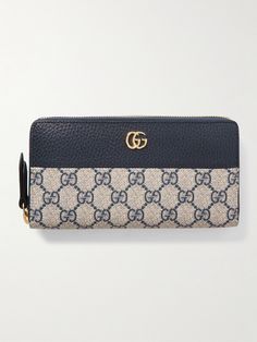 Gucci's sleek and streamlined wallet is part of the Italian house's signature 'Marmont' collection. Made from 'GG Supreme' coated-canvas in a '70s palette, it's detailed with textured-leather and the iconic logo plaque. Slip it into a coordinating tote. 70s Palette, Wallet Gucci, Canvas Wallet, Gucci Gg Marmont, Raffia Bag, Iconic Logo, Print Coat, Gg Marmont, Gucci Accessories