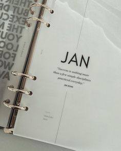 an open book with the words jan on it