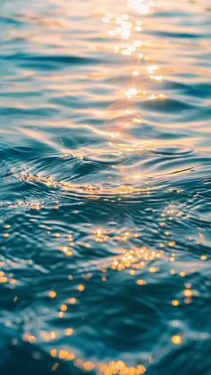 the sun shines brightly in the water as it reflects on the surface of the ocean