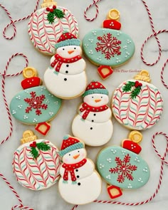 christmas cookies decorated with frosting and decorations