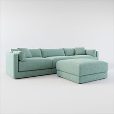 a blue sectional sofa with pillows on the back and footrests is shown in front of a white background