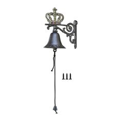 a metal bell with a crown on it next to hooks and screws in front of a white background