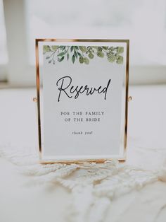 a sign that says reserved for the family on the table