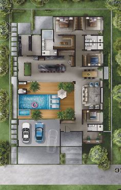 an aerial view of a house with two cars parked in the driveway