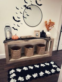 a halloween scene with bats on the wall