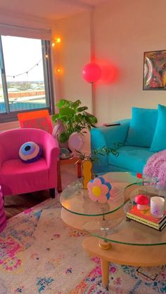 a living room filled with colorful furniture and decor