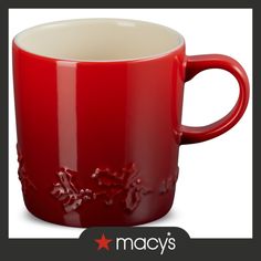 a red coffee mug with white inside