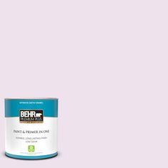 the behr paint is light beige and has a brown base with white lettering on it