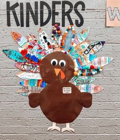 a turkey made out of paper on top of a brick wall with the words thanksgiving kids's crafts written above it