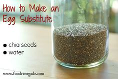 a jar filled with dirt sitting on top of a wooden table