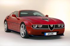 a red sports car is shown in this advert for alfa, which has been modified to