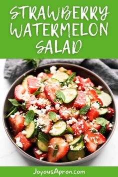 strawberry watermelon salad with feta cheese and cucumbers in a bowl