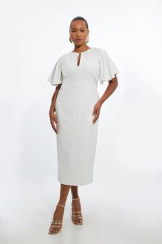 Feel Formal In Our Plus Size Midi Dress, Which Boasts A Figure Hugging Fit, A Classic Pencil Style, A Uniquely Notched Neckline, And Ruffled Sleeves. Style It With Court Heels Or Loafers For A Look That Will Take You From Date Nights To Office Days. Plus Size Structured Crepe Ruffle Sleeve Tailored Midi Pencil Dress High Quality Stretchy Crepe Fabric Figure Hugging Fit Sleek, Minimal Design Slender V Neckline Unique Ruffle Sleeves Expertly Designed For Those Uk Size 18/Us Size 14 And Above, Our Plus Size Red Dress, Graduation Attire, Hen Do Outfits, Bride Jumpsuit, Plus Size Midi Dress, Petite Wedding Guest Dresses, Clothing Apps, Wedding Pants, Dubai Outfits