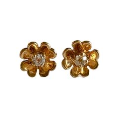 These stunning Four Leaf Clover earrings are crafted out of 14K Gold and feature a prong set eye clean Old Mine Cut Diamond in each earring. These beautiful earrings are sure to bring good luck to whoever wears them! Note: all of the following measurements are approximate Item Details Overall Dimensions: 9.08mm X 9.08mm Diamond: 2.90mm - 3.07mm, (0.20 Carat CTW) Color: L - M, Clarity: SI1 Birthdate Stone: April Weight: 2.0gm Hallmark: None - tested as 14K (backs are marked 14K) Closure: Push Bac Classic Yellow Gold Flower-shaped Cluster Earrings, Classic Gold Diamond Flower-shaped Earrings, Formal Yellow Gold Flower Earrings With Prong Setting, Classic Flower Earrings, Classic 14k Gold Flower-shaped Earrings, Classic 14k Gold Flower Earrings For Anniversary, Heirloom Screw Back Earrings For Anniversary, Vintage Yellow Gold Flower Shaped Earrings, Classic Yellow Gold Flower Earrings For Formal Occasions