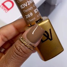 A milk chocolate brown. The duo includes: 1 Soak-Off Gel Size: 0.5 fl oz 1 Nail Lacquer Size: 0.5 fl oz Color Accuracy: The duo comes with 1 lacquer and 1 gel in matching colors. We do not guarantee matching exact colors due to differences in formulation, ingredients, and batch. Benefits: Lasts up to 21 days LED and UV cured Made in USA Wide range of colors Fused with vitamins that make nails stronger, healthier and stunning for weeks HOW TO: Gel Polish Application - Prep your nails - Remove old Dnd Nails Fall, Chocolate Brown Nails, Find Your Peace, Old Nail Polish, Lipstick Nails, Daisy Nails