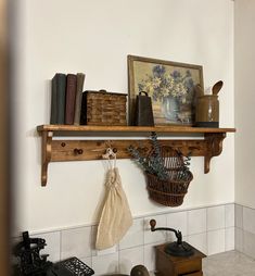 a shelf with books and other items on it