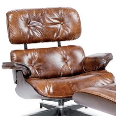 an office chair and ottoman with leather upholster