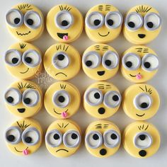 many yellow faces are arranged in the shape of small eyes and nose shapes with black centers