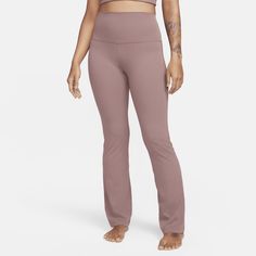 Keep it simple—but not basic—in these flare-leg, high-waisted pants. Their Infinalon fabric is irresistibly soft and smooth while giving a gently compressive feel that hugs your body so you can stretch and move without limits. With sweat-wicking fabric and a wide waistband, you'll feel cool and supported as you move from pose to pose. Nike Yoga, Women Lifestyle, Flared Pants, Keep It Simple, Wide Waistband, Sport Pants, Flare Pants, Active Wear For Women, High Waisted Pants