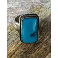 This Vintage Sterling Silver Ring Features A Rectangular Turquoise Stone, Showcasing A Unique Blend Of Blue Hues With Natural Veining. The Ring Is Stamped With "925" Indicating Its Sterling Silver Composition. A Timeless Piece, It Combines The Elegance Of Precious Metal With The Natural Beauty Of Turquoise, Making It An Exquisite Addition To Any Jewelry Collection. Sterling Silver Construction Rectangular Turquoise Stone Stamped With "925" Vintage Design Elegant And Unique Minor Patina On Silver. Top To Bottom = 0.75 Inches, Width = 0.5 Inches. 13.12g All Items Are Tested, Checked And Listed As Described. Size: Womens 8 Condition: Pre-Owned Good Good Condition As Silver Turquoise Ring, Sterling Silver Rings Turquoise, Silver Top, Vintage Sterling Silver Rings, Good Good, Precious Metal, 925 Jewelry, Silver Turquoise, Blue Hues