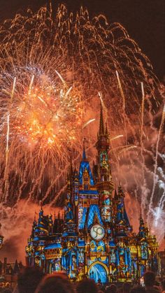 the castle is lit up with fireworks and lights