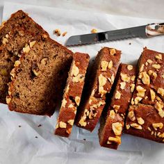 slices of banana nut bread next to a knife