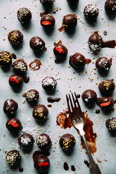 chocolate truffles with sprinkles and a fork