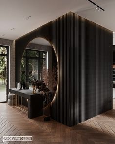 a living room filled with furniture and a large window covered in wood slatting