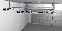 an image of a garage with overhead lighting and the measurements for the door to enter it